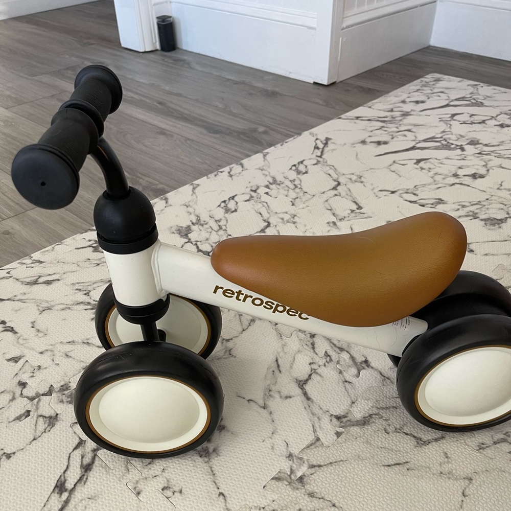 Retrospec Cricket Balance Bike with 4 Wheels for Ages 12-24 months.